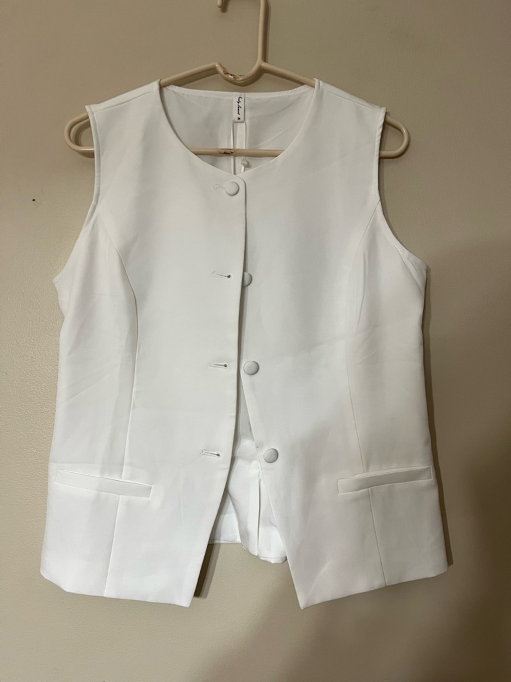 Sleeveless White Button-Front Vest